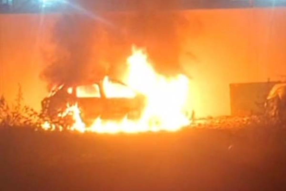 Midnight Blaze: Car Parked in Vacant Lot Erupts into a Ball of Fire, Reduced to Ashes in Minutes; Major Disaster Averted Thanks to Fire Department's Swift Response.